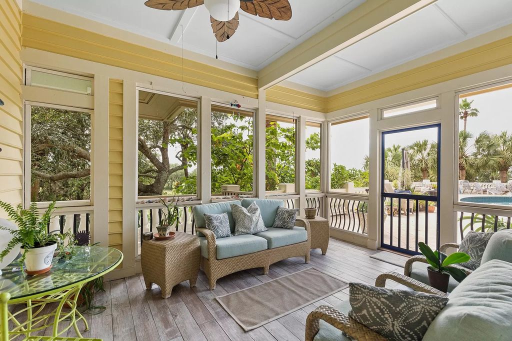 The Retreat in Isle Of Palms offers a spacious interior, inviting outdoor living spaces and mature landscaping, now available for sale. This home located at 61 Ocean Poin, Isle Of Palms, South Carolina