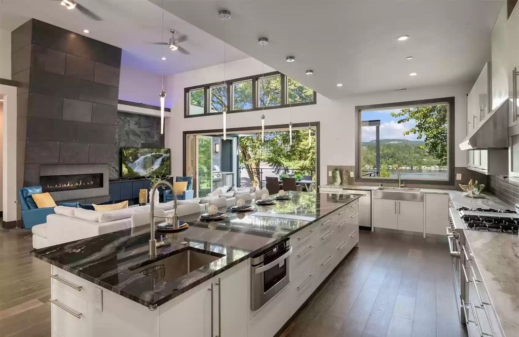 The Estate in Mercer Island is a magnificent light-filled home featuring unrivaled artistry and remarkable architecture now available for sale. This home located at 6002 E Mercer Way, Mercer Island, Washington; offering 05 bedrooms and 05 bathrooms with 4,315 square feet of living spaces.