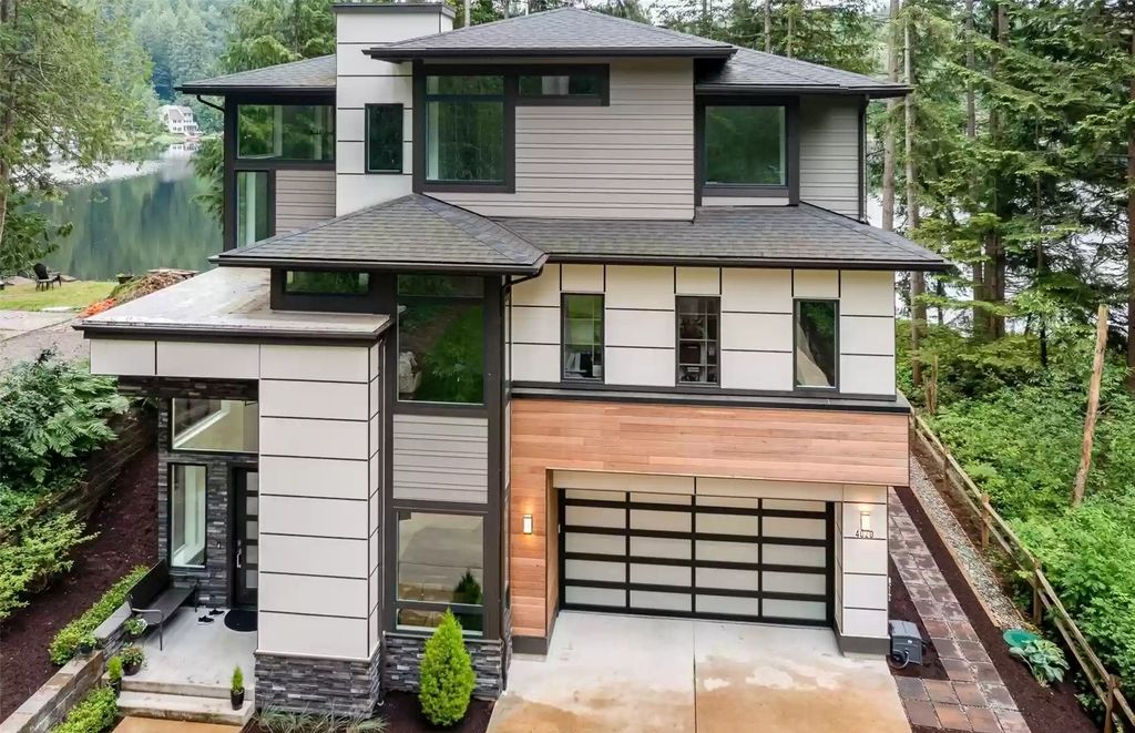 The Home in Redmond is defined by its timeless, undeniable quality that is met with an exciting, modern flair, now available for sale. This home located at 4020 W Ames Lake Drive, Redmond, Washington