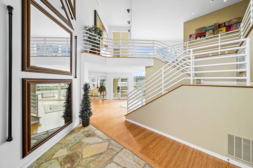The House in Cassopolis has a Luxury Miami Vibe and a well-designed floor plan with separate split upper levels, now available for sale. This home located at 62234 Carlton Dr, Cassopolis, Michigan