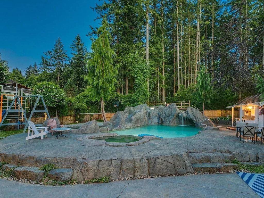 The Home in Surrey is a custom built home with spectacular oasis private southern exposed backyard, now available for sale. This home located at 13390 22a Ave, Surrey, BC V4A 9T9, Canada