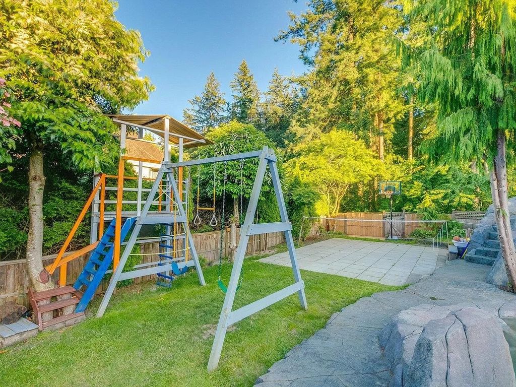 The Home in Surrey is a custom built home with spectacular oasis private southern exposed backyard, now available for sale. This home located at 13390 22a Ave, Surrey, BC V4A 9T9, Canada