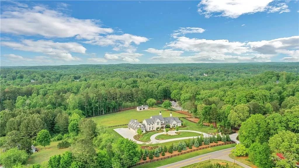 The Estate in Canton is a luxurious home perfectly situated on 13.20 manicured acres with spacious floor plan and expansive outdoor - indoor living spaces now available for sale. This home located at 2455 Lower Birmingham Rd, Canton, Georgia; offering 07 bedrooms and 08 bathrooms with 8,700 square feet of living spaces. 