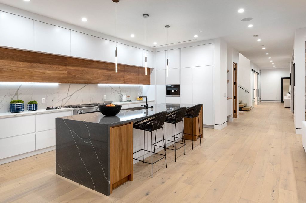 The Home in Venice is a newer construction home features an open floor plan, high ceilings and oversized windows that create a bright crisp ambiance now available for sale. This home located at 2319 Penmar Ave, Venice, California