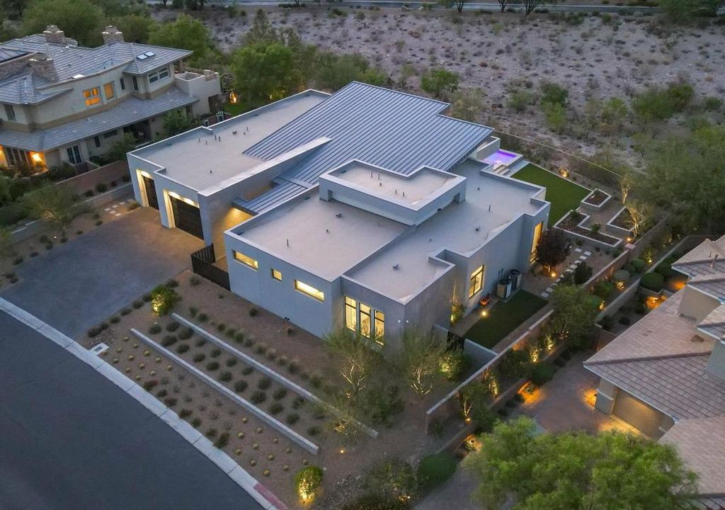 The Home in Las Vegas, a modern single story custom residence in Redhawk of The Ridges with majestic mountain views is now available for sale. This home located at 46 Soaring Bird Ct, Las Vegas, Nevada