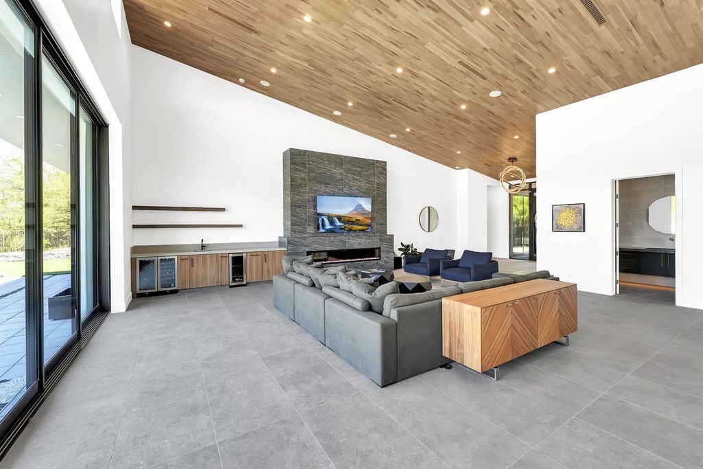 The Home in Las Vegas, a modern single story custom residence in Redhawk of The Ridges with majestic mountain views is now available for sale. This home located at 46 Soaring Bird Ct, Las Vegas, Nevada