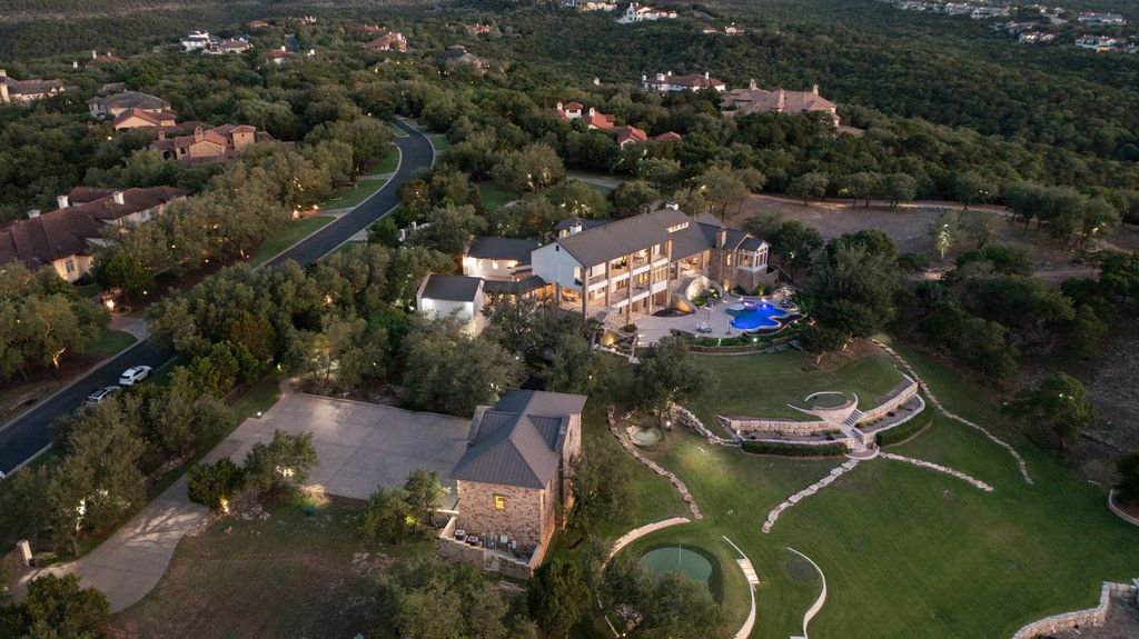 The Home in Austin is a one of a kind compound in the coveted community of Escala at Barton Creek with panoramic views of Hill Country and Fazio Canyons now available for sale. This home located at 7841 Escala Dr, Austin, Texas