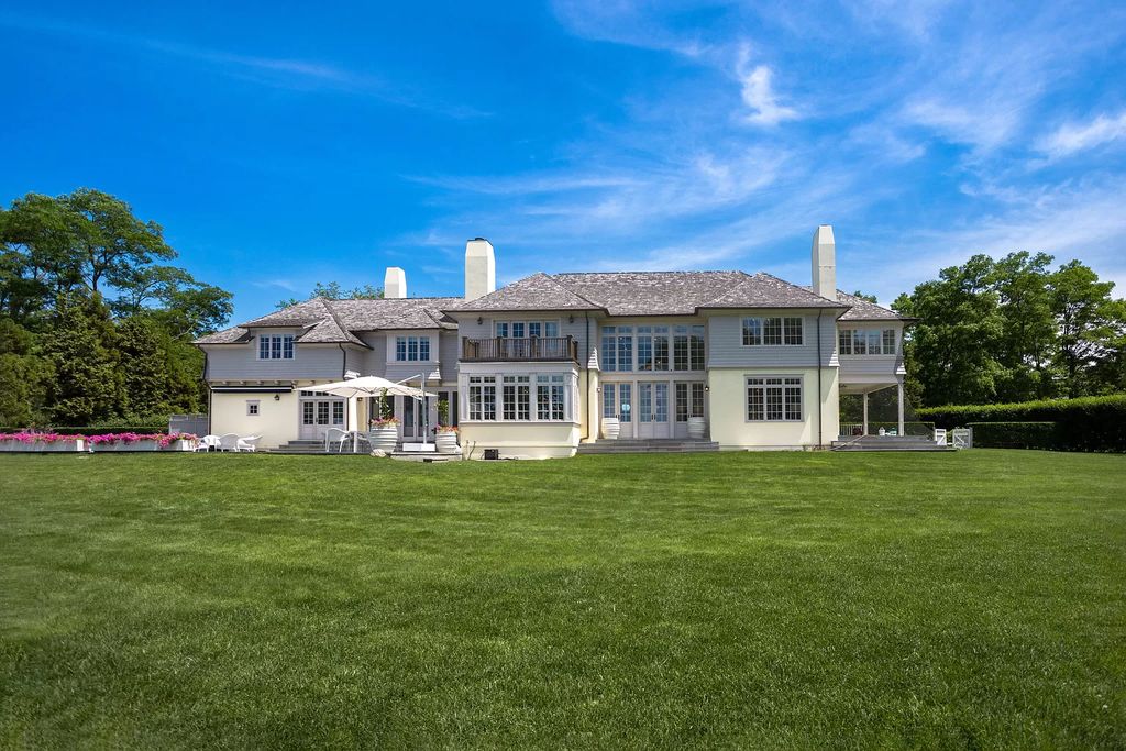 The Home in Sag Harbor, a gated residence set on a truly unique and special location with over 400 feet of direct waterfront and multiple entertaining spaces is now available for sale. This home located at 35 Ezekills Holw, Sag Harbor, New York