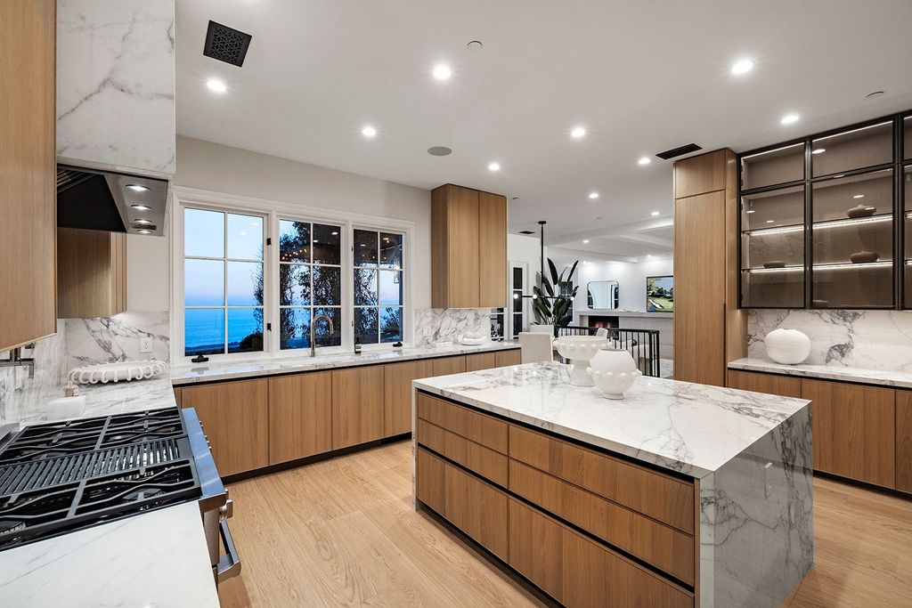 The Home in Newport Coast positioned on a premiere unobstructed front row within the privacy and protection of Coastal Orange Counties now available for sale. This home located at 38 Pelican Crest Dr, Newport Coast, California