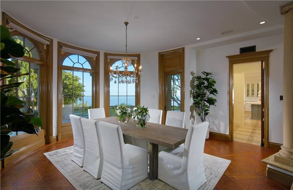 The Villa in Newport Coast is a Pelican Crest showpiece estate was just refreshed in 2022 and enjoys unobstructed views of the Pacific Ocean now available for sale. This home located at 14 Channel Vis, Newport Coast, California