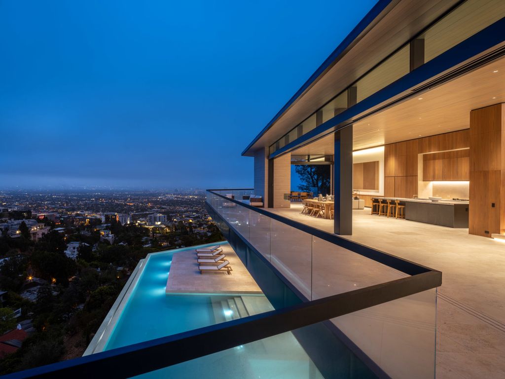 The Home in Los Angeles is a brand new modern mansion designed by Vantage Design Group features the finest finishes, incredible volume, and jetliner views now available for sale. This home located at 11630 Moraga Ln, Los Angeles, California