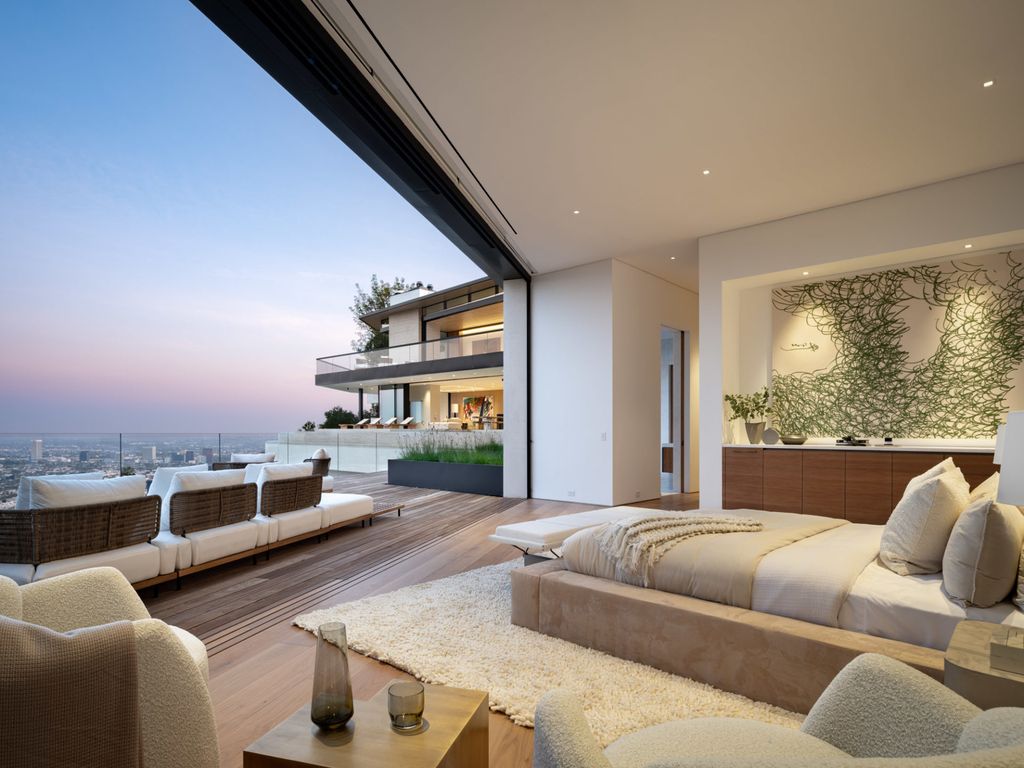 The Home in Los Angeles is a brand new modern mansion designed by Vantage Design Group features the finest finishes, incredible volume, and jetliner views now available for sale. This home located at 11630 Moraga Ln, Los Angeles, California