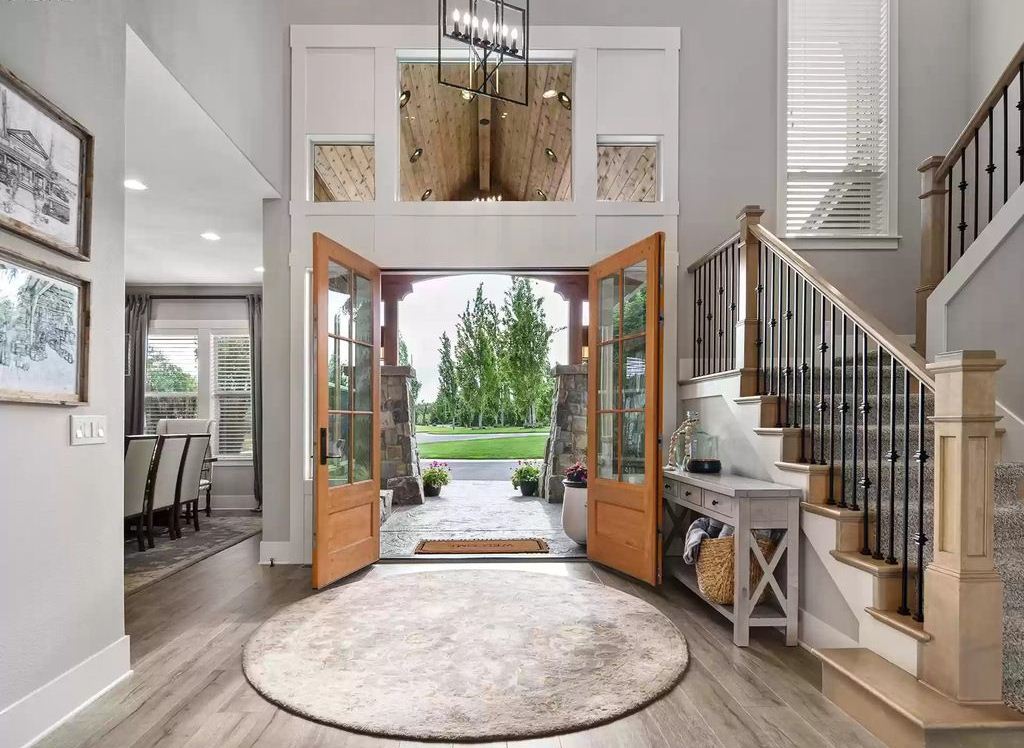 The Home in Ridgefield has seamless flow from 2-story entry to formal dining, great room, gourmet kitchen, now available for sale. This home located at 18607 NW 41st Ave, Ridgefield, Washington