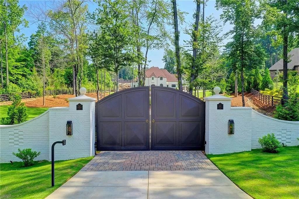 The Estate in Georgia is a luxurious home where you will find beautifully sculpted landscape, gorgeous vaulted ceilings, chef’s kitchen with top-of-the-line appliances and other incredible features now available for sale. This home located at 2242 Shoal Creek Rd, Buford, Georgia; offering 06 bedrooms and 08 bathrooms with 7,500 square feet of living spaces. 