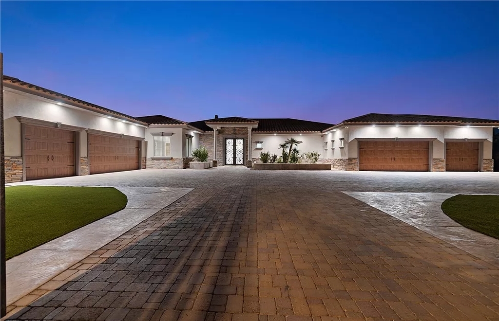 The Home in Las Vegas, a spectacular estate with the vibe and design featuring new luxurious and modern finishes throughout, and a stunning backyard. This home located at 9116 Hickam Ave, Las Vegas, Nevada.