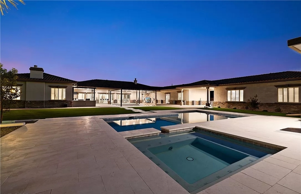 The Home in Las Vegas, a spectacular estate with the vibe and design featuring new luxurious and modern finishes throughout, and a stunning backyard. This home located at 9116 Hickam Ave, Las Vegas, Nevada.