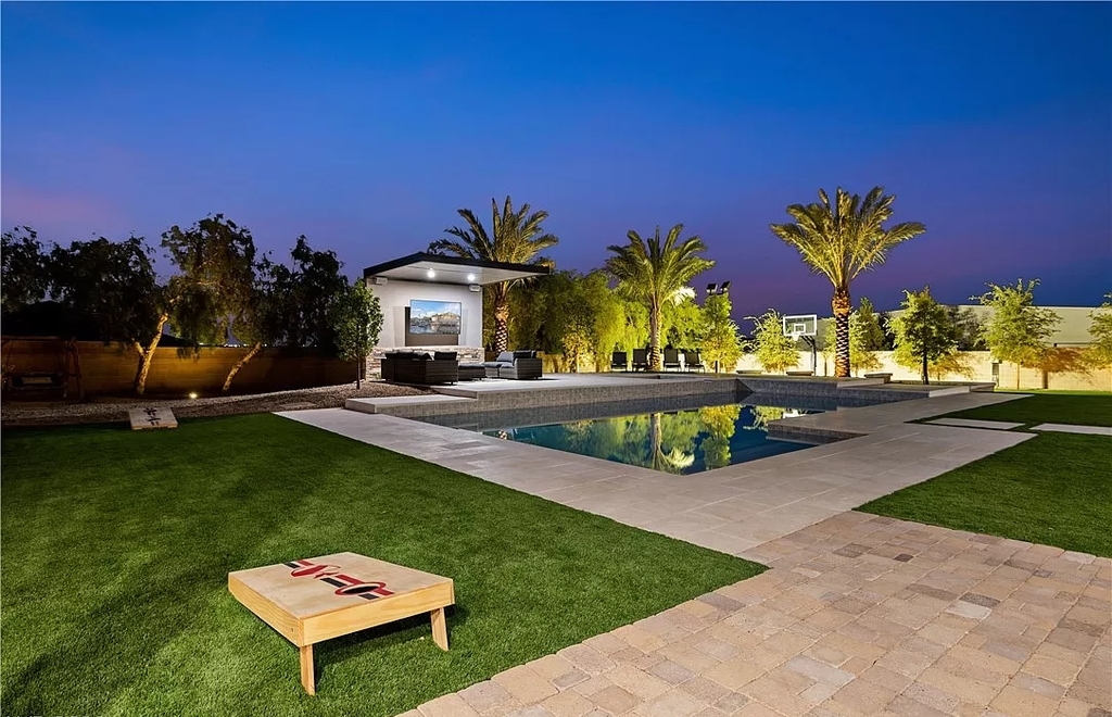 The Home in Las Vegas, a spectacular estate with the vibe and design featuring new luxurious and modern finishes throughout, and a stunning backyard. This home located at 9116 Hickam Ave, Las Vegas, Nevada.