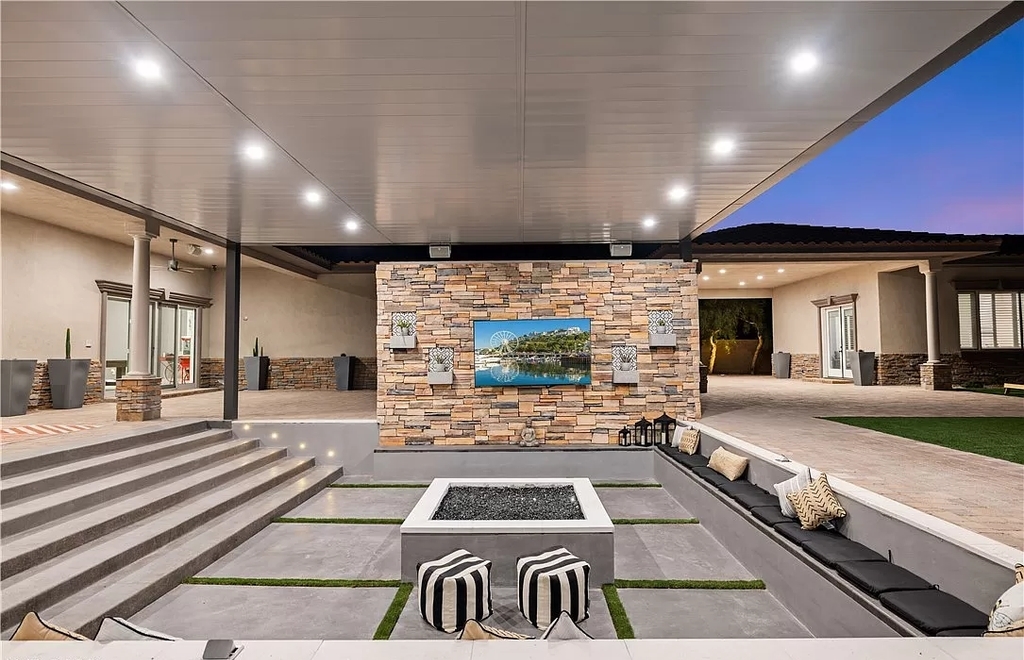 The Home in Las Vegas, a spectacular estate with the vibe and design featuring new luxurious and modern finishes throughout, and a stunning backyard. This home located at 9116 Hickam Ave, Las Vegas, Nevada.