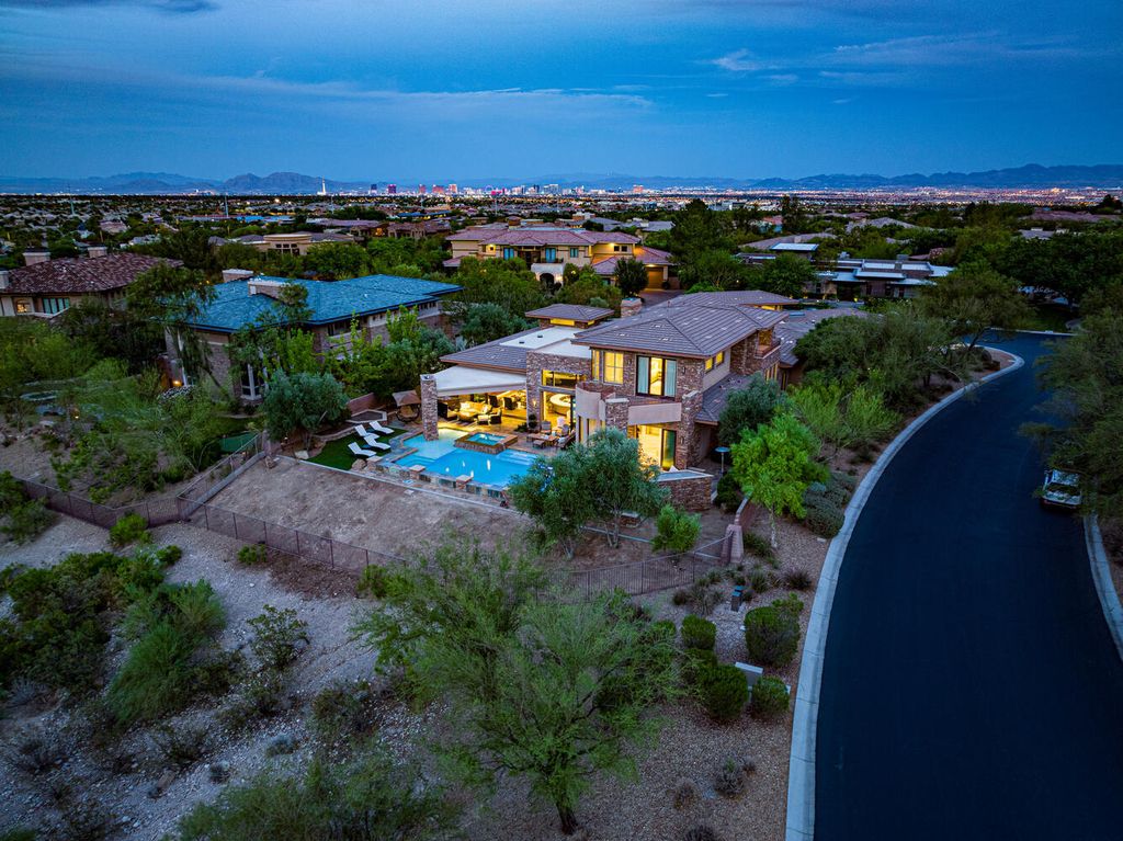 The Home in Las Vegas is a gorgeous unobstructed views residence has been updated and upgraded to the max with beautiful tasteful finishes now available for sale. This home located at 15 Wild Ridge Ct, Las Vegas, Nevada