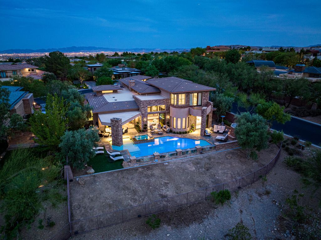 The Home in Las Vegas is a gorgeous unobstructed views residence has been updated and upgraded to the max with beautiful tasteful finishes now available for sale. This home located at 15 Wild Ridge Ct, Las Vegas, Nevada