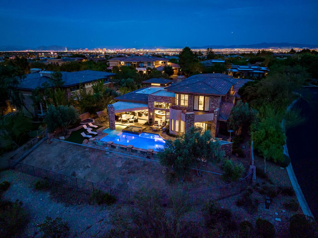 The Home in Las Vegas is a gorgeous unobstructed views residence has been updated and upgraded to the max with beautiful tasteful finishes now available for sale. This home located at 15 Wild Ridge Ct, Las Vegas, Nevada