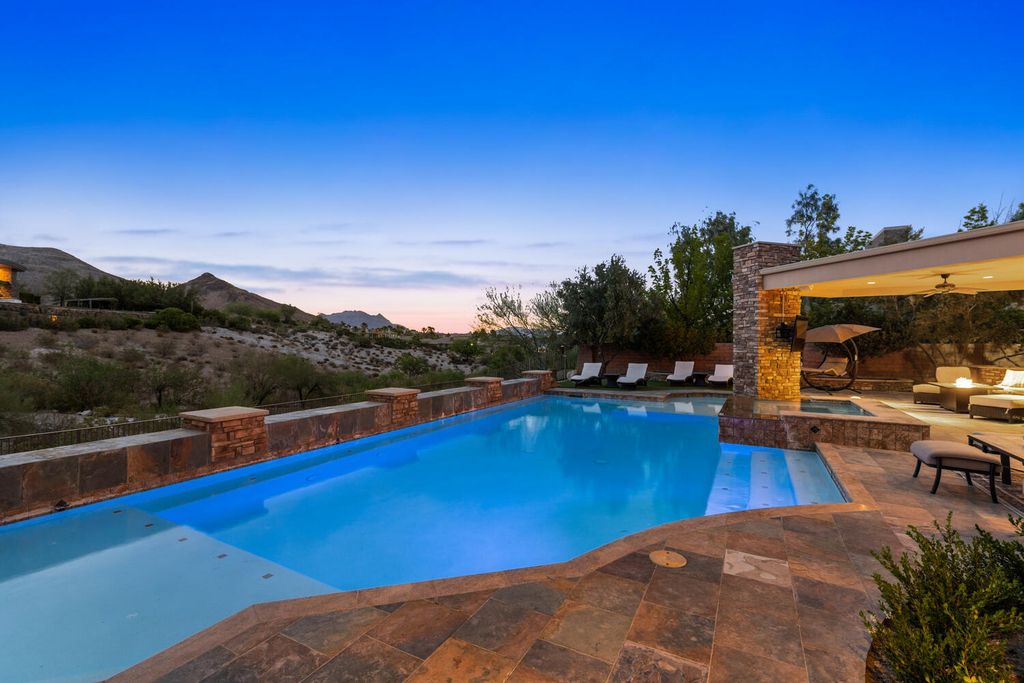 The Home in Las Vegas is a gorgeous unobstructed views residence has been updated and upgraded to the max with beautiful tasteful finishes now available for sale. This home located at 15 Wild Ridge Ct, Las Vegas, Nevada