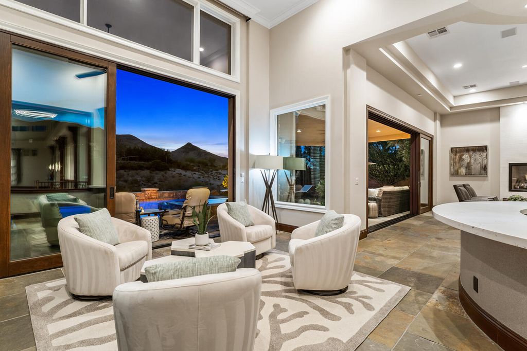 The Home in Las Vegas is a gorgeous unobstructed views residence has been updated and upgraded to the max with beautiful tasteful finishes now available for sale. This home located at 15 Wild Ridge Ct, Las Vegas, Nevada