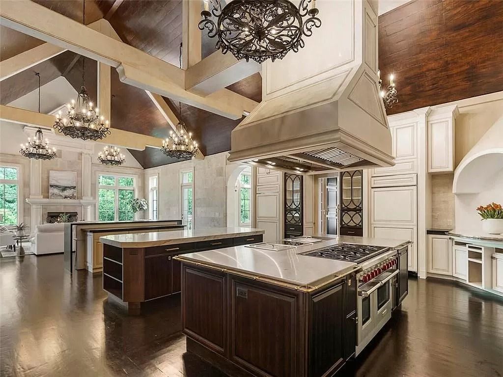 The Estate in Sandy Springs is a luxurious home featuring massive entertainer's kitchen with 3 enormous islands for cooking, prep, and serving now available for sale. This home located at 6420 Riverside Dr NW, Sandy Springs, Georgia; offering 08 bedrooms and 15 bathrooms with 23,137 square feet of living spaces.
