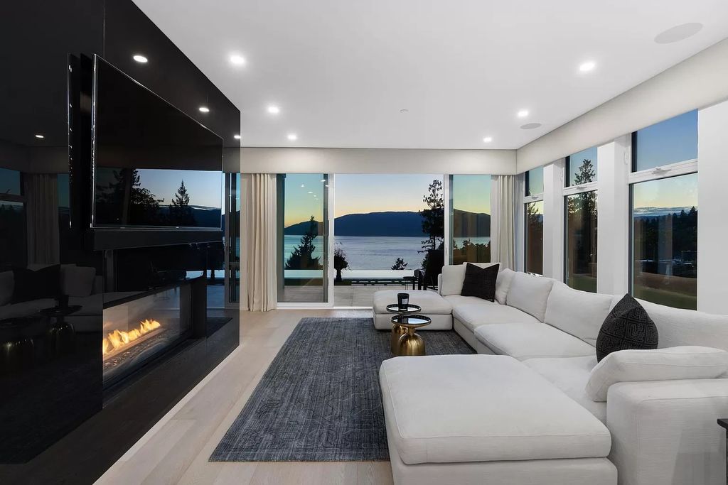 The Estate in West Vancouver is a chic entertainer’s dream home with luxurious interior living, now available for sale. This home located at 5428 Marine Dr, West Vancouver, BC V7W 2N6, Canada