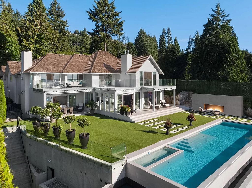 The Estate in West Vancouver is a chic entertainer’s dream home with luxurious interior living, now available for sale. This home located at 5428 Marine Dr, West Vancouver, BC V7W 2N6, Canada