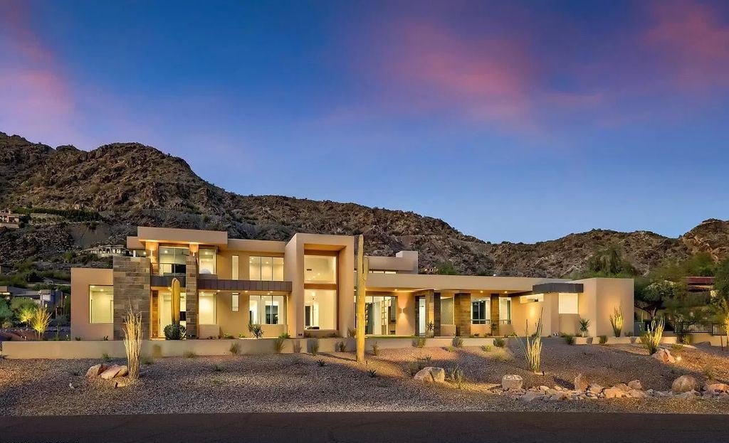 The Home in Paradise Valley, a stunning contemporary residence with breathtaking views of both Camelback & Mummy Mountains from almost every room is now available for sale. This home located at 5720 E Joshua Tree Ln, Paradise Valley, Arizona 