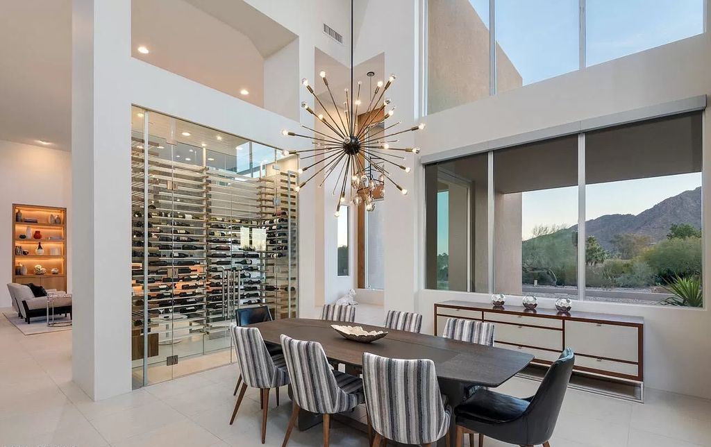 The Home in Paradise Valley, a stunning contemporary residence with breathtaking views of both Camelback & Mummy Mountains from almost every room is now available for sale. This home located at 5720 E Joshua Tree Ln, Paradise Valley, Arizona 