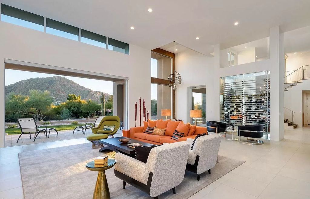 The Home in Paradise Valley, a stunning contemporary residence with breathtaking views of both Camelback & Mummy Mountains from almost every room is now available for sale. This home located at 5720 E Joshua Tree Ln, Paradise Valley, Arizona 