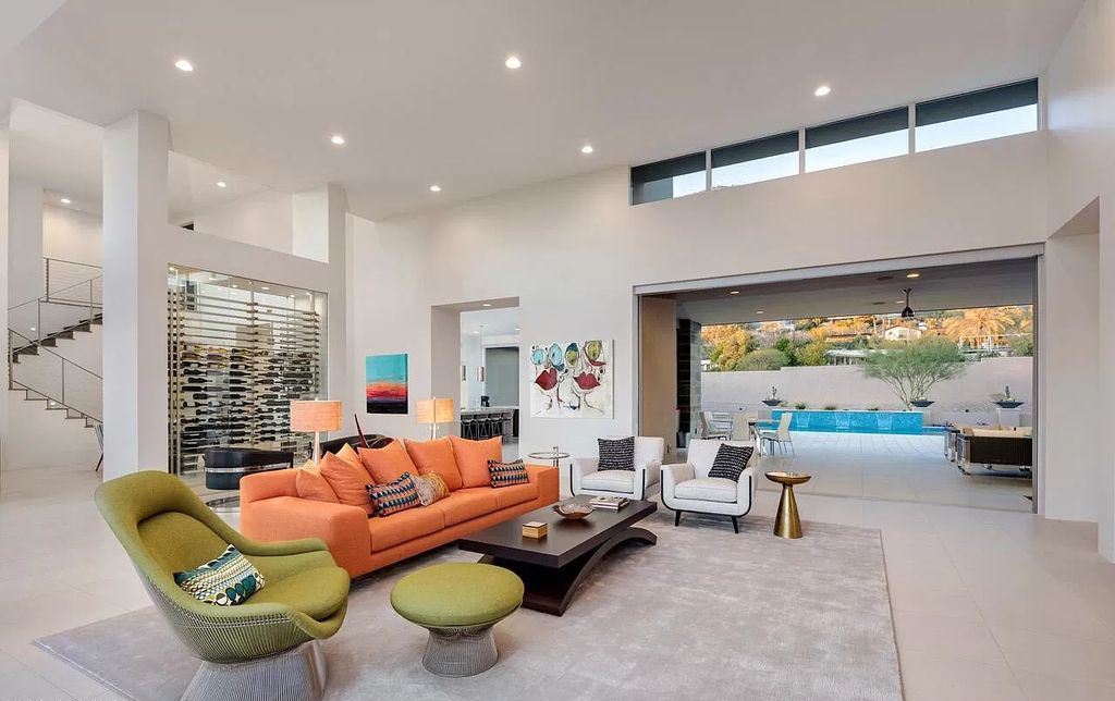 The Home in Paradise Valley, a stunning contemporary residence with breathtaking views of both Camelback & Mummy Mountains from almost every room is now available for sale. This home located at 5720 E Joshua Tree Ln, Paradise Valley, Arizona 