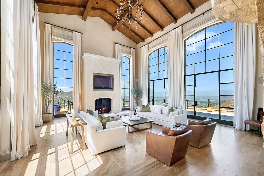 The Estate in Malibu, an opulent Italian Villa set on 37 pristine acres offering breathtaking views of the Santa Monica mountains, Pacific Ocean, Conejo Valley and city lights beyond is now available for sale. This home located at 340 N Kanan Dume Rd, Malibu, California