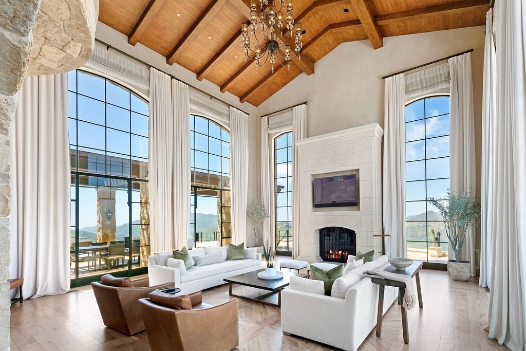 The Estate in Malibu, an opulent Italian Villa set on 37 pristine acres offering breathtaking views of the Santa Monica mountains, Pacific Ocean, Conejo Valley and city lights beyond is now available for sale. This home located at 340 N Kanan Dume Rd, Malibu, California