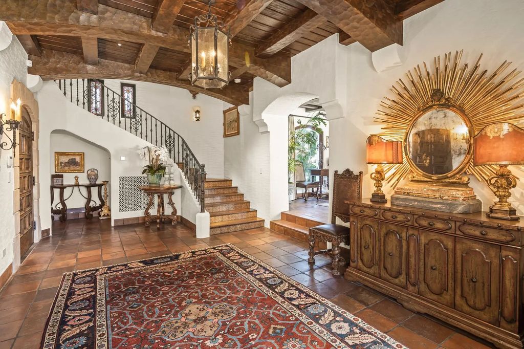 The Estate in Coronado, a historical landmark sits on a palm-lined promenade offering state-of-the-art amenities for optimal luxury living space, 100-year-old rustic olive trees, three fountains, a putting green, secret garden is now available for sale. This home located at 1127 F Ave, Coronado, California