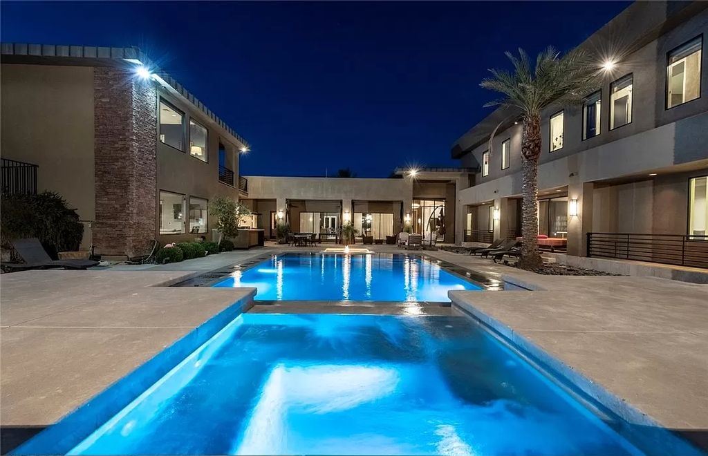 The Home in Henderson, a luxurious custom estate located inside prestigious McDonald’s Highlands with stunning entertainers delight backyard is now available for sale. This home located at 1465 Macdonald Ranch Dr, Henderson, Nevada