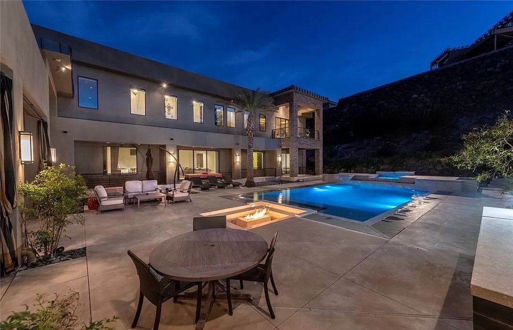 The Home in Henderson, a luxurious custom estate located inside prestigious McDonald’s Highlands with stunning entertainers delight backyard is now available for sale. This home located at 1465 Macdonald Ranch Dr, Henderson, Nevada