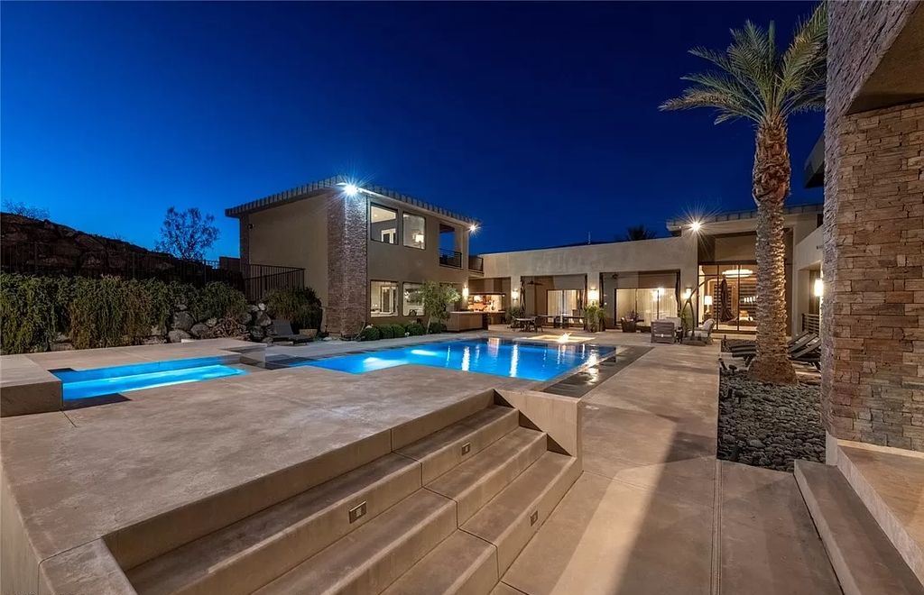 The Home in Henderson, a luxurious custom estate located inside prestigious McDonald’s Highlands with stunning entertainers delight backyard is now available for sale. This home located at 1465 Macdonald Ranch Dr, Henderson, Nevada