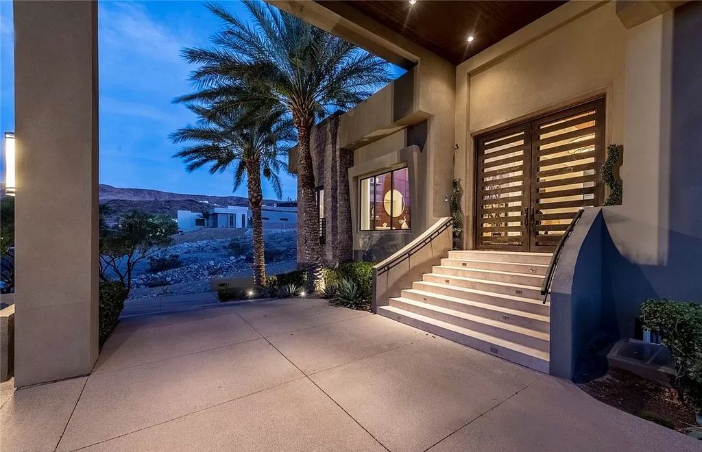 The Home in Henderson, a luxurious custom estate located inside prestigious McDonald’s Highlands with stunning entertainers delight backyard is now available for sale. This home located at 1465 Macdonald Ranch Dr, Henderson, Nevada