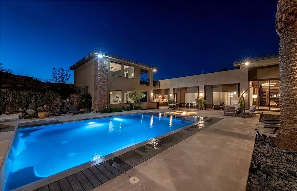 The Home in Henderson, a luxurious custom estate located inside prestigious McDonald’s Highlands with stunning entertainers delight backyard is now available for sale. This home located at 1465 Macdonald Ranch Dr, Henderson, Nevada