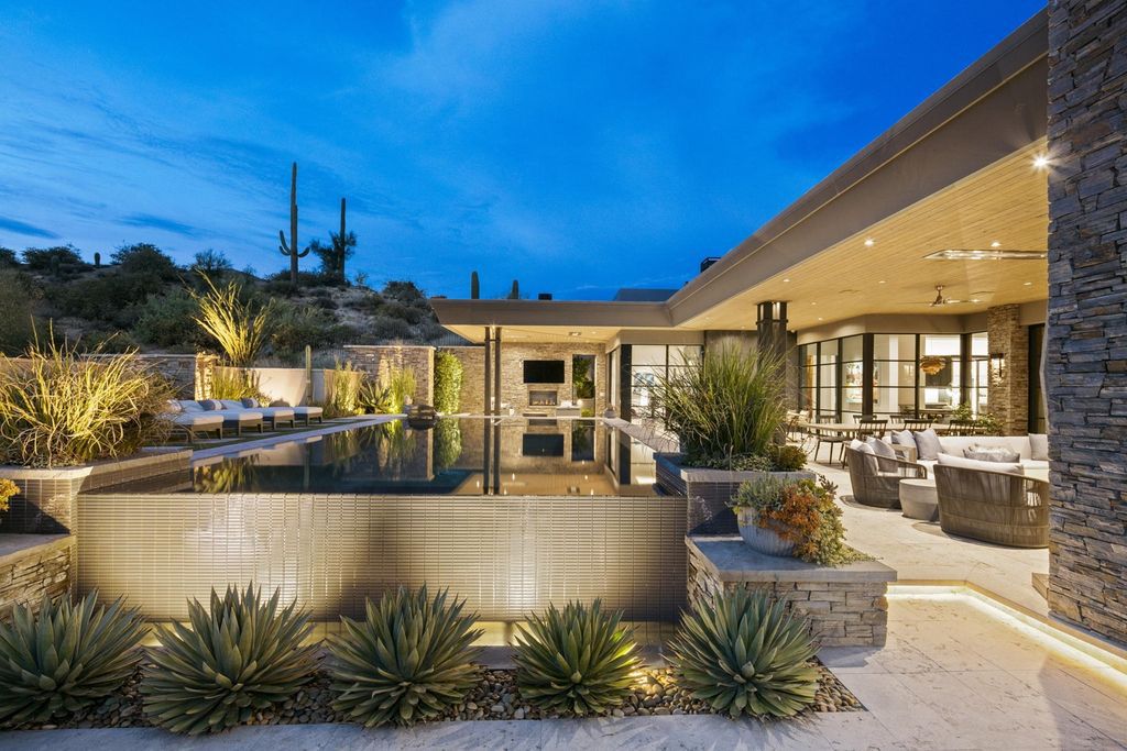 The Home in Scottsdale, a Simply stunning contemporary masterpiece in Saguaro Forest thoughtfully sited on 2.5 acre lot for privacy and striking mountain views is now available for sale. This home located at 9716 E Mariola Way, Scottsdale, Arizona