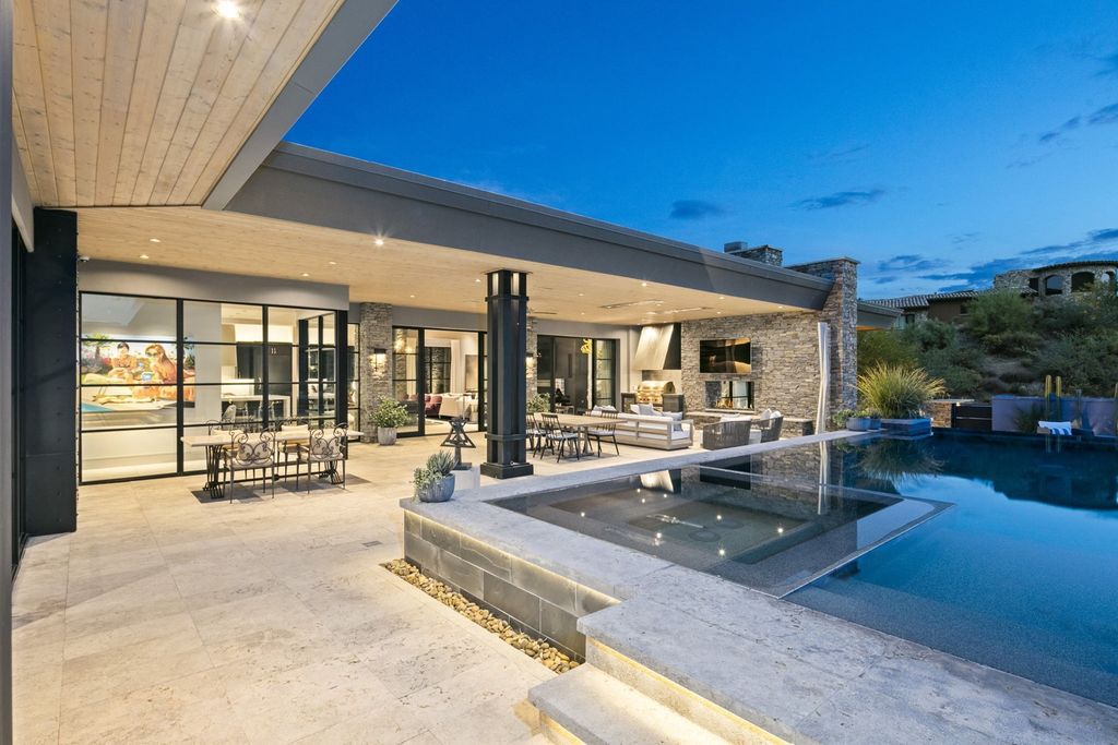 The Home in Scottsdale, a Simply stunning contemporary masterpiece in Saguaro Forest thoughtfully sited on 2.5 acre lot for privacy and striking mountain views is now available for sale. This home located at 9716 E Mariola Way, Scottsdale, Arizona