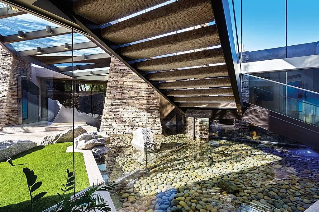 The Home in Palm Desert, a stunning contemporary residence tucked above the 2nd green of BIGHORN'S Mountain course with dramatic down-valley views is now available for sale. This home located at 161 Wanish Pl, Palm Desert, California