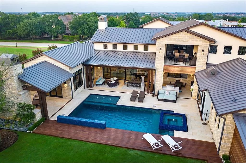 The Home in Westlake, a transitional style estate with clean lines, stunning steel, glass doors throughout, Ipe wood accents and spacious outdoor entertaining is now available for sale. This home located at 1714 Post Oak Pl, Westlake, Texas