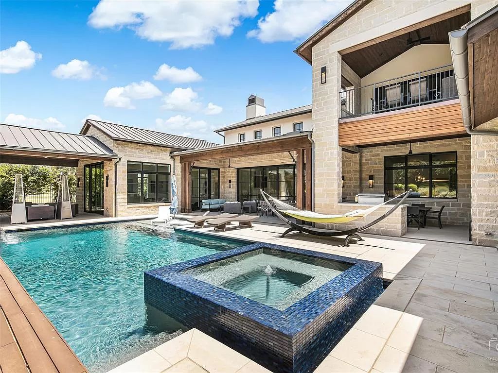 The Home in Westlake, a transitional style estate with clean lines, stunning steel, glass doors throughout, Ipe wood accents and spacious outdoor entertaining is now available for sale. This home located at 1714 Post Oak Pl, Westlake, Texas