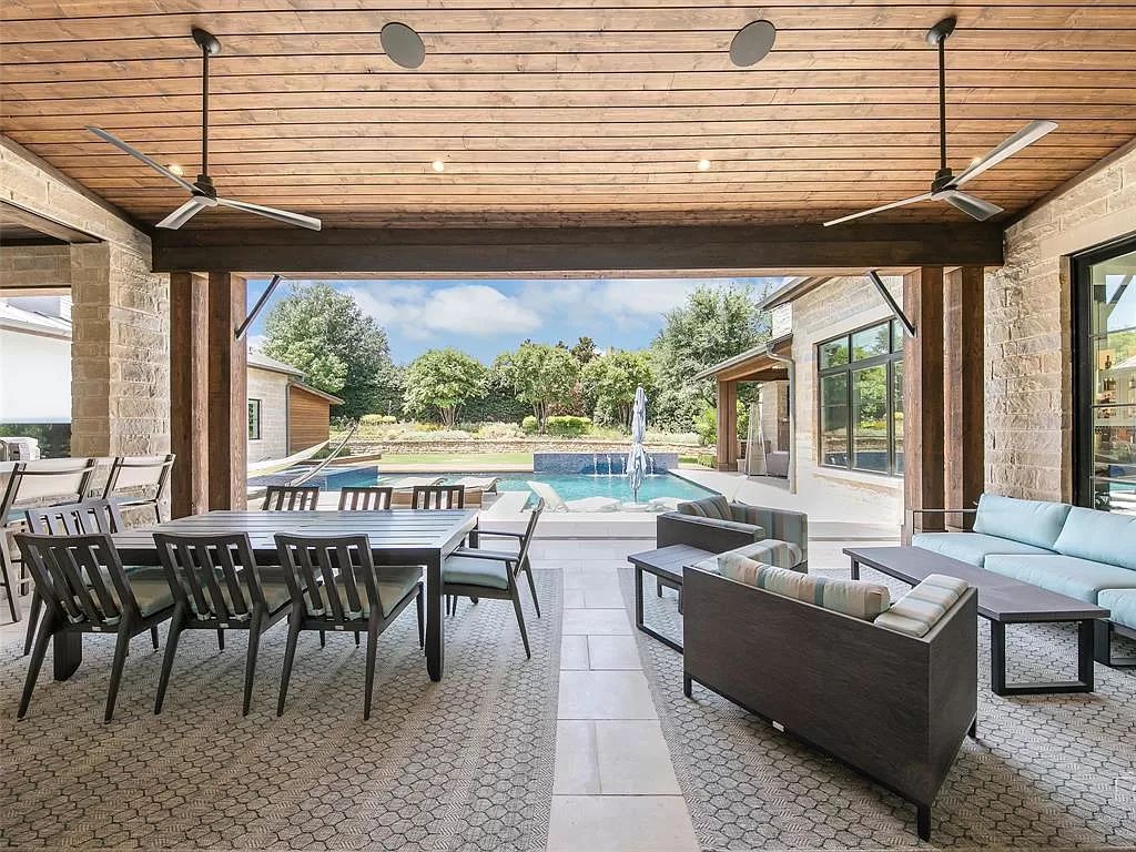 The Home in Westlake, a transitional style estate with clean lines, stunning steel, glass doors throughout, Ipe wood accents and spacious outdoor entertaining is now available for sale. This home located at 1714 Post Oak Pl, Westlake, Texas