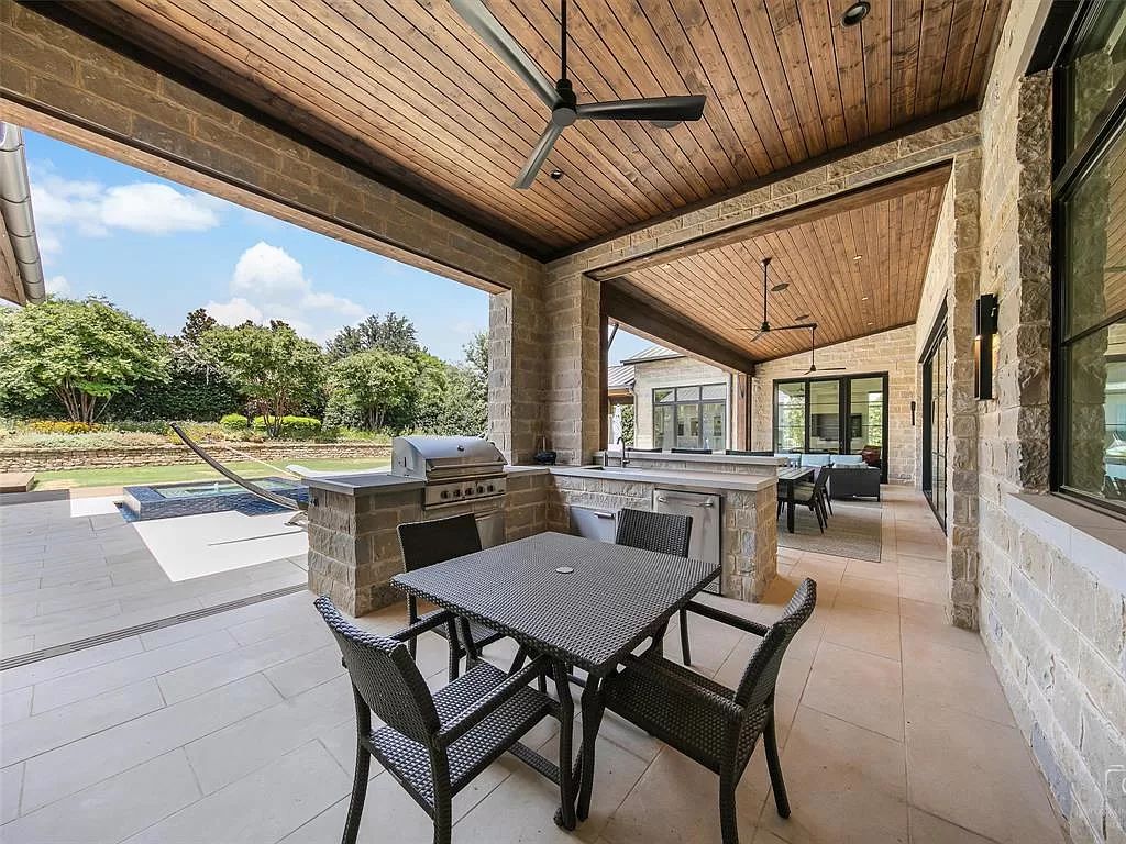 The Home in Westlake, a transitional style estate with clean lines, stunning steel, glass doors throughout, Ipe wood accents and spacious outdoor entertaining is now available for sale. This home located at 1714 Post Oak Pl, Westlake, Texas