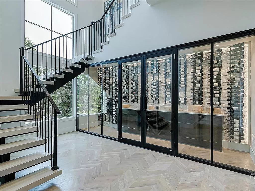 The Home in Westlake, a transitional style estate with clean lines, stunning steel, glass doors throughout, Ipe wood accents and spacious outdoor entertaining is now available for sale. This home located at 1714 Post Oak Pl, Westlake, Texas